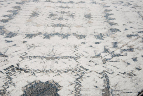 8' Beige Blue Gray And Rust Geometric Area Rug