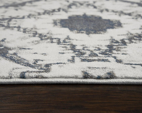 8' Beige Blue Gray And Rust Geometric Area Rug