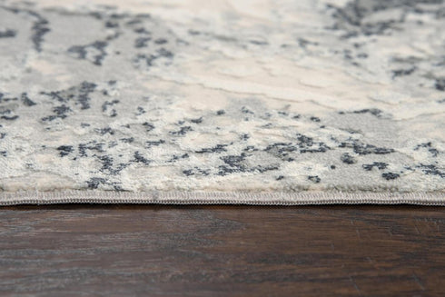 5' X 8' Cream Gray And Taupe Abstract Area Rug