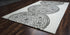 7' X 10' White And Ivory Wool Geometric Hand Tufted Area Rug