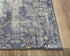 5' X 8' Gold Charcoal And Ivory Abstract Area Rug