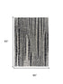 5' X 8' Beige Black Ivory And Gray Abstract Area Rug