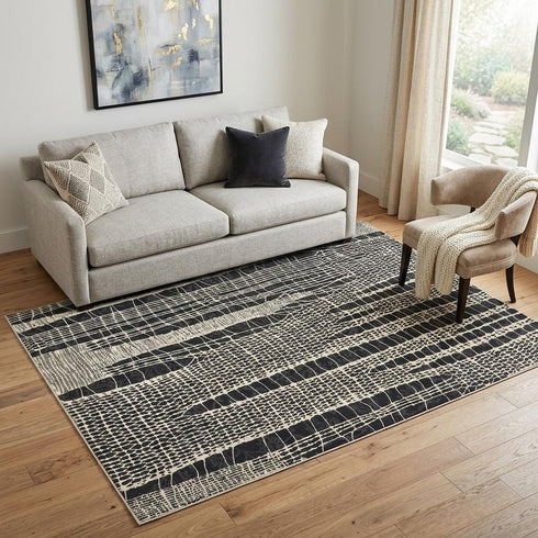 5' X 8' Beige Black Ivory And Gray Abstract Area Rug
