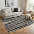 5' X 8' Beige Black Ivory And Gray Abstract Area Rug