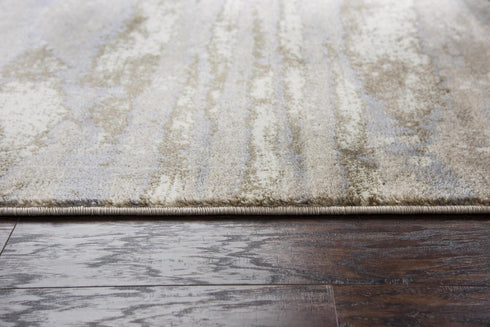 8' X 10' Beige Ivory Light Brown And Light Gray Abstract Area Rug