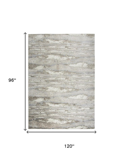 8' X 10' Beige Ivory Light Brown And Light Gray Abstract Area Rug