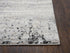 8' X 10' Beige Gray Black And Brown Abstract Area Rug