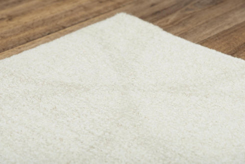 5' X 8' Ivory And Beige Wool Geometric Hand Tufted Area Rug