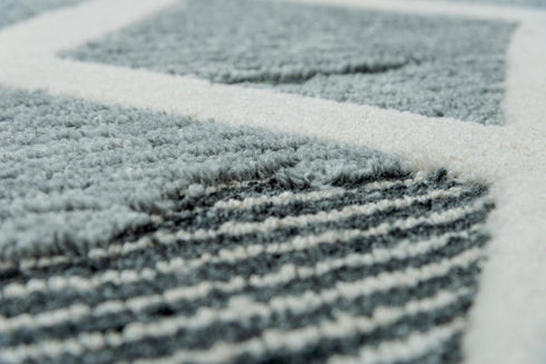 5' X 8' Charcoal And Ivory Geometric Hand Tufted Area Rug