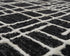 5' X 8' Black And Ivory Wool Geometric Hand Tufted Area Rug