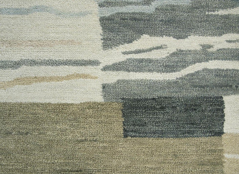 7' X 10' Beige And Natural Wool Abstract Hand Tufted Area Rug