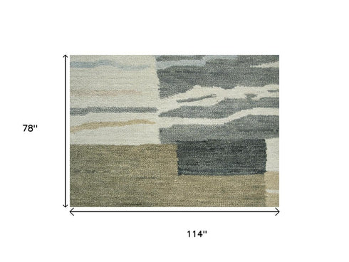 7' X 10' Beige And Natural Wool Abstract Hand Tufted Area Rug