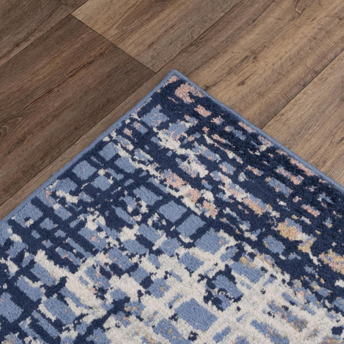 8' X 10' Navy Blue Pink Yellow Gray And Ivory Abstract Area Rug