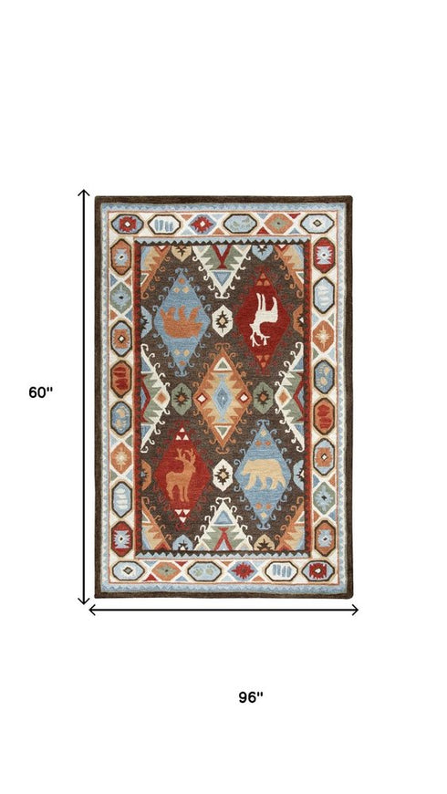 5' X 8' Brown Blue Beige And Red Wool Southwestern Hand Tufted Area Rug
