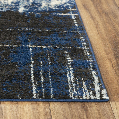 8' X 10' Blue Black Beige And Ivory Abstract Area Rug