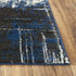 8' X 10' Blue Black Beige And Ivory Abstract Area Rug