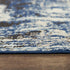8' X 10' Blue Black Beige And Ivory Abstract Area Rug