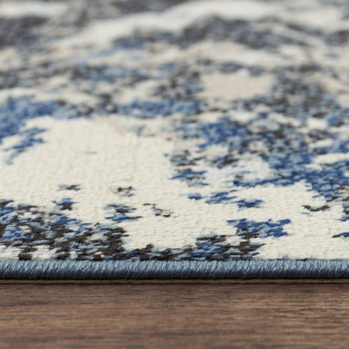 8' X 10' Blue Black Beige And Ivory Abstract Area Rug
