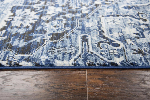 5' X 8' Blue Ivory And Dark Blue Oriental Area Rug