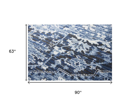 5' X 8' Blue Ivory And Dark Blue Oriental Area Rug