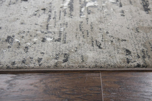 5' X 8' Taupe Gray Ivory Black And Beige Medallion Area Rug