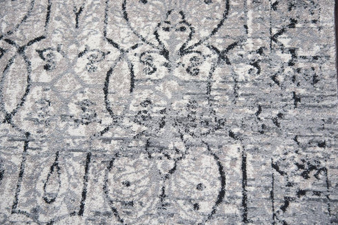 5' X 8' Taupe Natural Gray And Black Oriental Area Rug