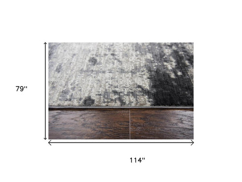 7' X 10' Beige Taupe Tan Gray And Dark Gray Abstract Area Rug