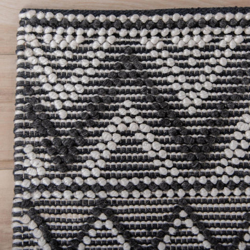 8' X 10' Gray Black And Ivory Chevron Hand Woven Area Rug With UV Protection
