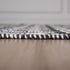 9' X 12' Gray Black And Ivory Chevron Hand Woven Area Rug With UV Protection