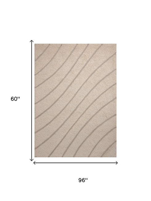 5' X 8' Cream And Beige Wool Abstract Hand Tufted Area Rug
