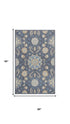 5' X 8' Dark Gray Blue And Tan Wool Floral Hand Tufted Area Rug