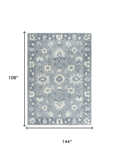 9' X 12' Blue Dark Blue And Ivory Wool Oriental Hand Tufted Area Rug