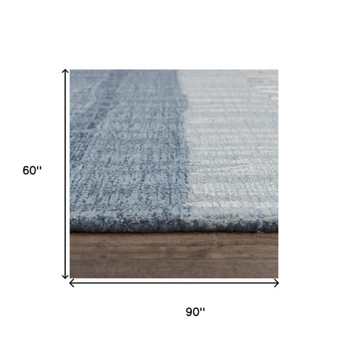 5' X 8' Tan And Natural Wool Striped Hand Tufted Area Rug