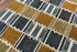 9' X 12' Gray Brown Ivory And Gold Wool Geometric Hand Tufted Area Rug