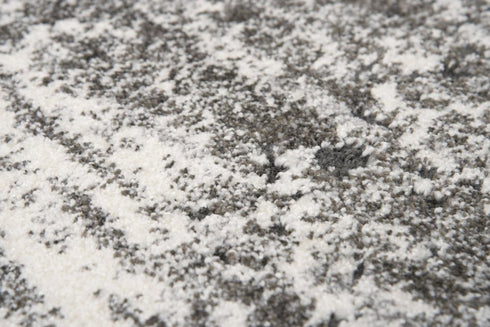 5' X 8' Ivory Silver And Taupe Abstract Area Rug