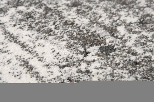 7' X 10' Ivory Silver And Taupe Abstract Area Rug