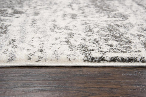 7' X 10' Ivory Silver And Taupe Abstract Area Rug