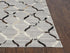 5' X 8' Gray Ivory Brown And Charcoal Geometric Hand Woven Area Rug