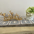 Adore the Decor™ Deep Gold Elephant Family Bridge Figurine - 7"