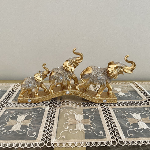 Adore the Decor™ Deep Gold Elephant Family Bridge Figurine - 7"